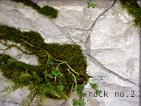 擬岩と植栽を使ったオフィスインテリアの画像